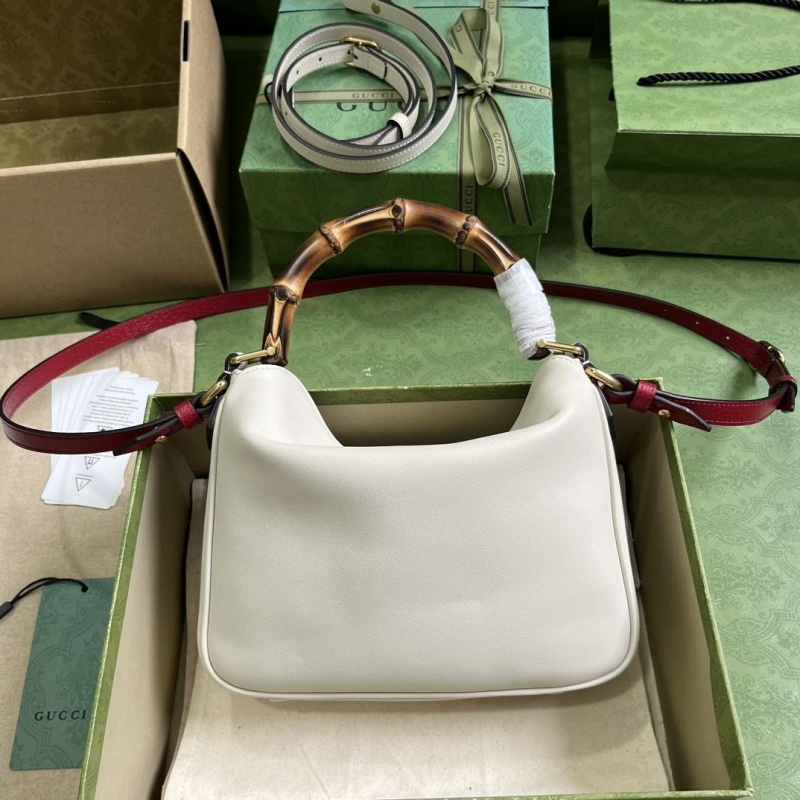 G*u*i top handle bags